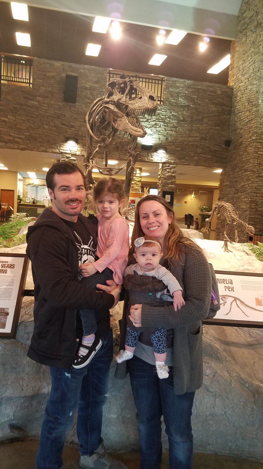 Cole with his wife and daughters on a family outing